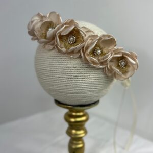 Diadema floral en rosa empolvado con perlas